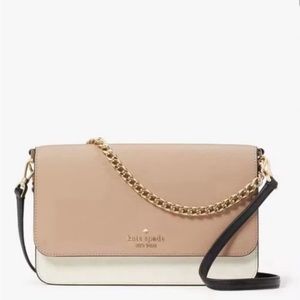 Used Kate Spade cross body bag with gold chain, excellent condition.